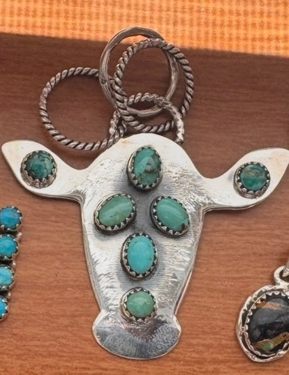 Cow pendent