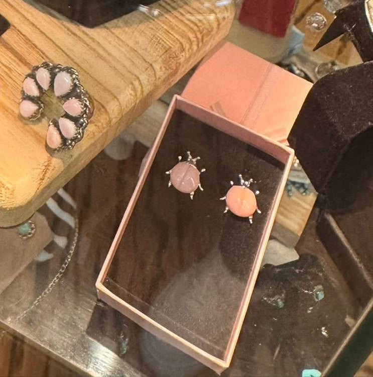Pink conch lady bug earrings