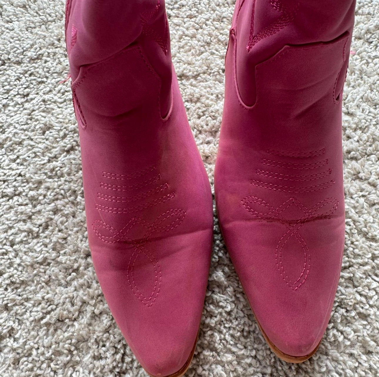 Pink woman’s boots