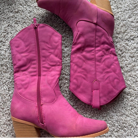 Pink woman’s boots